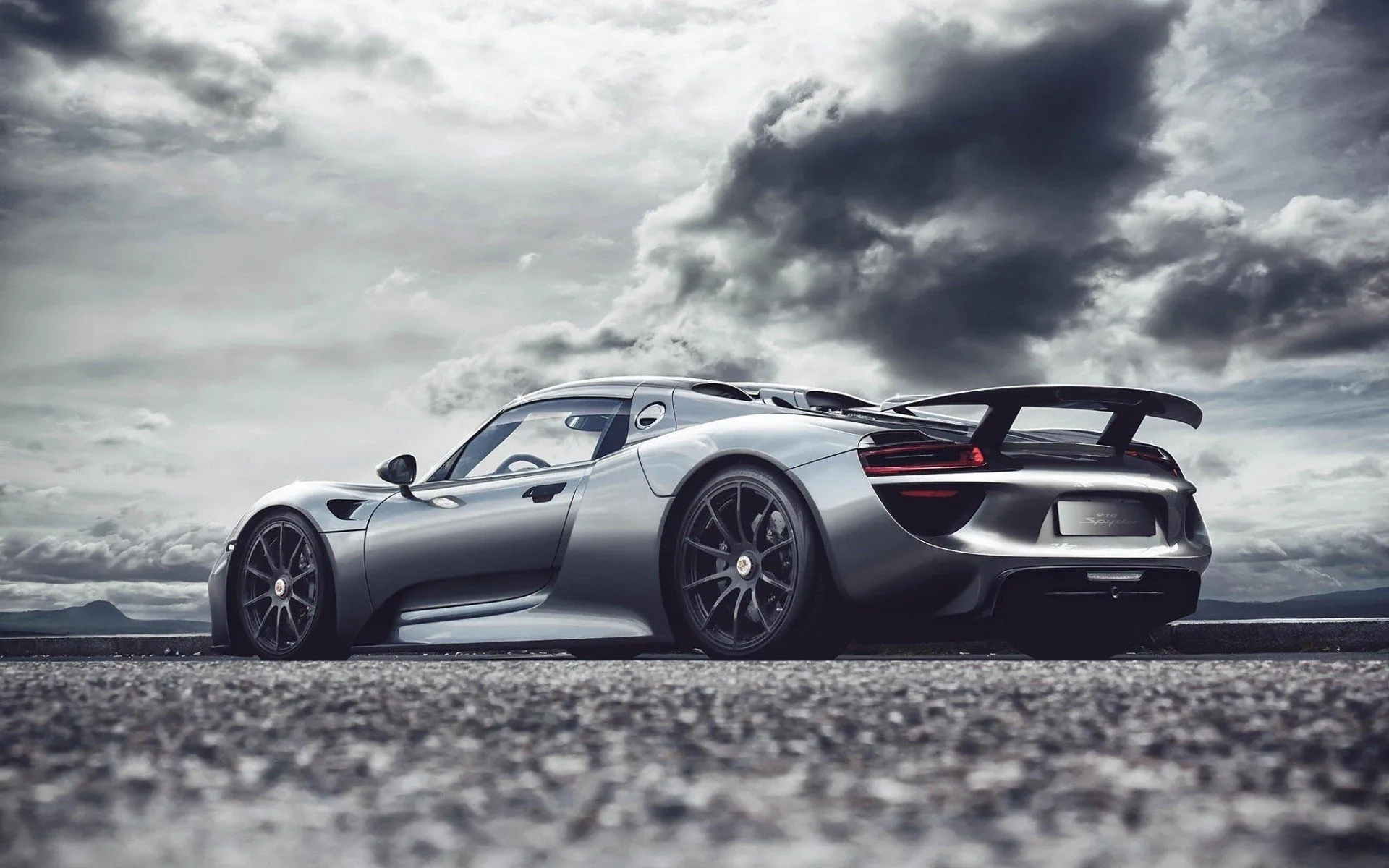 Mobile window tinting service, dark sports car