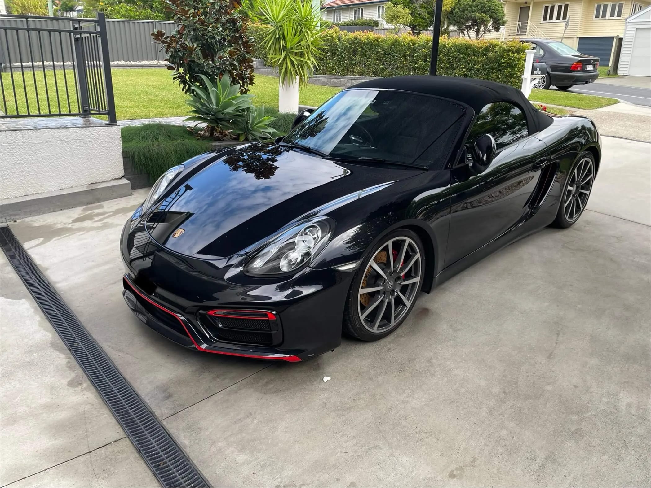 Black Porsche Boxster ceramic-coated by R1 Auto
